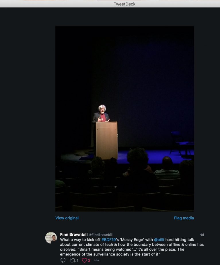 Tweet from @finnbrownhill about my talk, with picture of me at podium
